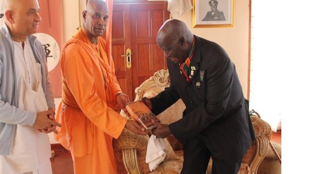 President of Zambia receives a copy of the Gita